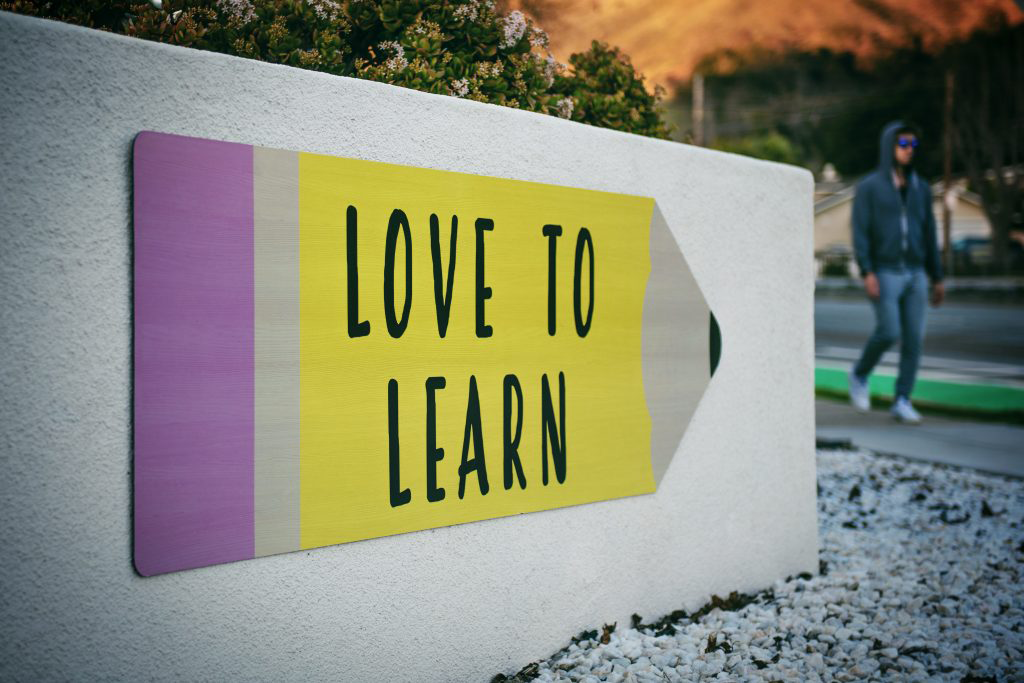 Ein Schild mit der Aufschrift love to learn
